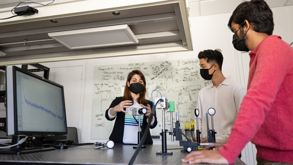 Three researchers in a lab